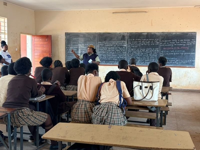 Classroom full of pupils attending a school session